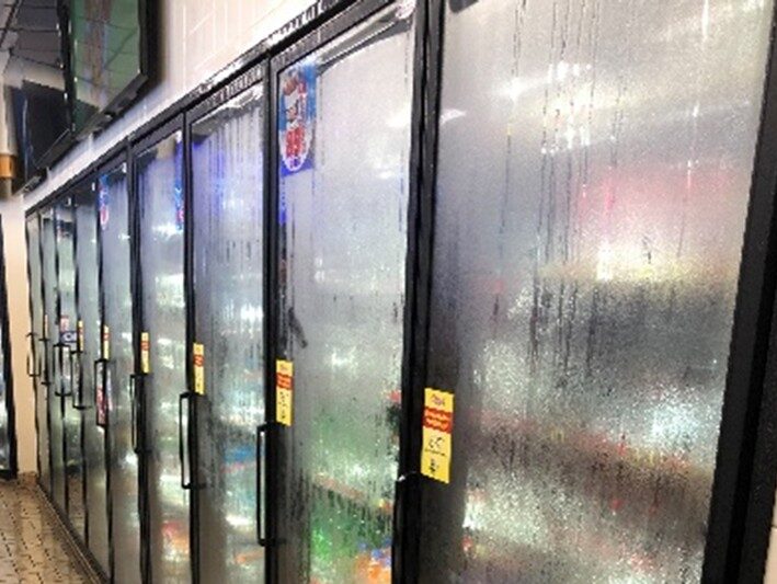 conveniience store cooler doors with condensation