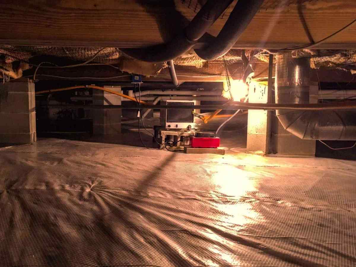 crawl-space-with-liner Crawl space with full white liner across floor and walls in Pensacola, FL<br />