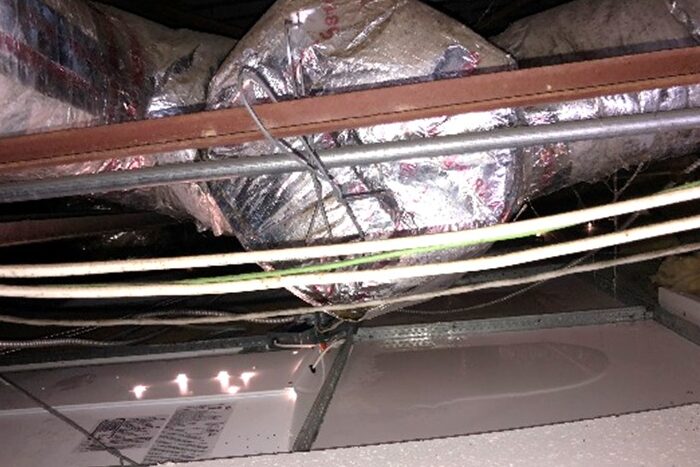 sweating-duct-and-misture-in-attic-convenience-store-panama-city-fl.png sweating duct in convenience store